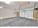 Large garage with bright lighting is great for easily parking two cars at 11318 W Monte Vista Rd, Avondale, AZ 85392