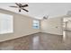 Spacious living room with neutral paint, and a ceiling fan at 11318 W Monte Vista Rd, Avondale, AZ 85392