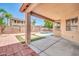 Covered patio has views of the pool, backyard, and a neighboring two-story home at 11318 W Monte Vista Rd, Avondale, AZ 85392