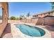 Beautiful private pool in the backyard is surrounded by lush greenery and attractive patio at 11318 W Monte Vista Rd, Avondale, AZ 85392