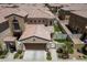 An aerial view of a neighborhood featuring a home with a well manicured backyard at 1367 S Country Club Dr # 1331, Mesa, AZ 85210