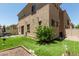Manicured backyard with artificial grass, decorative plantings and privacy fence at 1367 S Country Club Dr # 1331, Mesa, AZ 85210