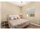 Bedroom with a large bed, hardwood floors, and a window that allows natural light to brighten the space at 1367 S Country Club Dr # 1331, Mesa, AZ 85210