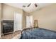 Bedroom featuring a metal frame bed, hardwood floors, and dresser at 1367 S Country Club Dr # 1331, Mesa, AZ 85210