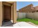 Charming home featuring a private, fenced backyard with artificial turf, creating a low-maintenance outdoor space at 1367 S Country Club Dr # 1331, Mesa, AZ 85210