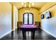 Elegant game room with a pool table, ornate chandelier, decorative doors, and wall-mounted TVs at 1367 S Country Club Dr # 1331, Mesa, AZ 85210