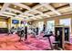 Well-equipped gym featuring modern exercise equipment, multiple TVs, and large windows with natural light at 1367 S Country Club Dr # 1331, Mesa, AZ 85210