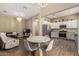 Open-concept room showing kitchen, dining area and living room at 1367 S Country Club Dr # 1331, Mesa, AZ 85210