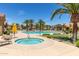 Beautiful community pool area with hot tub, palm trees, and comfortable lounge chairs, perfect for relaxation at 1367 S Country Club Dr # 1331, Mesa, AZ 85210