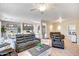 Open concept living area with neutral tones and modern furnishings at 15314 W Pantano Dr, Surprise, AZ 85374