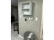 Clean hallway area with convenient thermostat, shelving, and modern decor at 1734 W Tuckey Ln # 14, Phoenix, AZ 85015