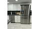 Modern kitchen showcasing stainless steel appliances, sleek cabinetry, and stylish countertops at 1734 W Tuckey Ln # 14, Phoenix, AZ 85015