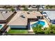 Aerial view of the home featuring a sparkling pool, covered patio, and well-maintained landscaping at 1862 E Tulane Dr, Tempe, AZ 85283