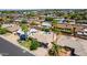Aerial view of a suburban neighborhood with houses, palm trees, and sparkling pools in the backyard at 1862 E Tulane Dr, Tempe, AZ 85283