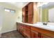 Spacious bathroom featuring a double sink vanity with wood cabinets and drawers at 1862 E Tulane Dr, Tempe, AZ 85283
