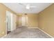Spacious bedroom featuring a ceiling fan and neutral carpet at 1862 E Tulane Dr, Tempe, AZ 85283