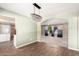 Dining area features a chandelier, wood floors, and an open view to the living room at 1862 E Tulane Dr, Tempe, AZ 85283