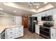 Well-equipped kitchen with black appliances and contrasting cabinets at 1862 E Tulane Dr, Tempe, AZ 85283