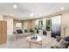 Cozy living room featuring plush seating, natural light and neutral tones for relaxation at 1862 E Tulane Dr, Tempe, AZ 85283