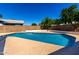 Clear shot of the crystal blue pool in the backyard with a brick wall at 1862 E Tulane Dr, Tempe, AZ 85283