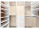Walk-in closet with custom shelving and drawers at 1862 E Tulane Dr, Tempe, AZ 85283