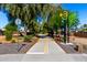 Well-maintained walking path surrounded by desert landscaping, with a stop sign at 1862 E Tulane Dr, Tempe, AZ 85283