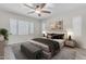 Comfortable bedroom with stylish furnishings, soft lighting, and a serene ambiance at 19606 W Grant St, Buckeye, AZ 85326