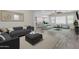 Bright and airy living room with modern furnishings and an open floor plan perfect for entertaining at 19606 W Grant St, Buckeye, AZ 85326