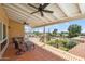 Spacious balcony with tile flooring and comfortable outdoor seating, perfect for enjoying the views at 2016 E Orangewood Ave, Phoenix, AZ 85020