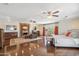 Bright main bedroom with a fireplace, hardwood floors, and private outdoor access at 2016 E Orangewood Ave, Phoenix, AZ 85020