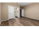 This bedroom has nice flooring and direct access to the bathroom at 20670 N 41St Ave, Glendale, AZ 85308