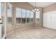 Bright dining room with tile flooring, large window and built-in storage at 20670 N 41St Ave, Glendale, AZ 85308