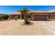 Charming single-Gathering home with desert landscaping and a tile roof, offering a warm curb appeal at 20670 N 41St Ave, Glendale, AZ 85308