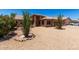 Inviting single-story home with desert landscaping and a terracotta-tiled roof under a clear blue sky at 20670 N 41St Ave, Glendale, AZ 85308