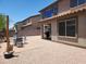 A spacious backyard with patio, gravel, and seating area is perfect for outdoor relaxation at 2317 E Mohave Ln, Apache Junction, AZ 85119
