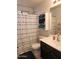 Functional bathroom features a shower-tub combo with a modern vanity at 2317 E Mohave Ln, Apache Junction, AZ 85119