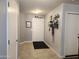 Welcoming entryway with tile flooring and a convenient coat closet at 2317 E Mohave Ln, Apache Junction, AZ 85119