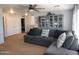 Inviting living area with a comfortable sectional sofa and built-in display cabinet at 2317 E Mohave Ln, Apache Junction, AZ 85119