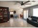 Open living space with tiled floors, leading to the kitchen and dining area at 2317 E Mohave Ln, Apache Junction, AZ 85119