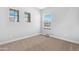 Simple, carpeted bedroom with three windows offering natural light and neighborhood views at 2565 S Signal Butte Rd # 30, Mesa, AZ 85209