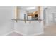 Eat-in kitchen offers bar-top seating and seamless flow to adjacent rooms at 2565 S Signal Butte Rd # 30, Mesa, AZ 85209