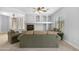 Bright living room showcasing a fireplace with built-in shelving and views of the backyard at 2565 S Signal Butte Rd # 30, Mesa, AZ 85209