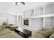 Spacious living room with a cozy fireplace, recessed lighting, and a decorative ceiling at 2565 S Signal Butte Rd # 30, Mesa, AZ 85209