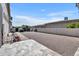 Large backyard featuring a gravel area, patio, and block wall at 2652 E Pelican Ct, Gilbert, AZ 85297