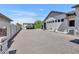 Spacious backyard features gravel area, carport, and partial view of home's exterior at 2652 E Pelican Ct, Gilbert, AZ 85297