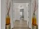 Bright entryway with hardwood floors, artful accents, and stylish lighting at 2652 E Pelican Ct, Gilbert, AZ 85297