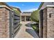 Inviting entrance with brick columns and a paved walkway leading to the front door at 2652 E Pelican Ct, Gilbert, AZ 85297