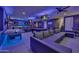 Finished basement transformed into a game room, featuring a pool table, foosball, and seating at 2652 E Pelican Ct, Gilbert, AZ 85297