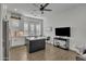 Modern eat-in kitchen featuring an island, stainless steel appliances, and lots of natural light at 2652 E Pelican Ct, Gilbert, AZ 85297