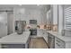 Spacious kitchen with stainless steel appliances, lots of cabinets, and a large center island at 2652 E Pelican Ct, Gilbert, AZ 85297